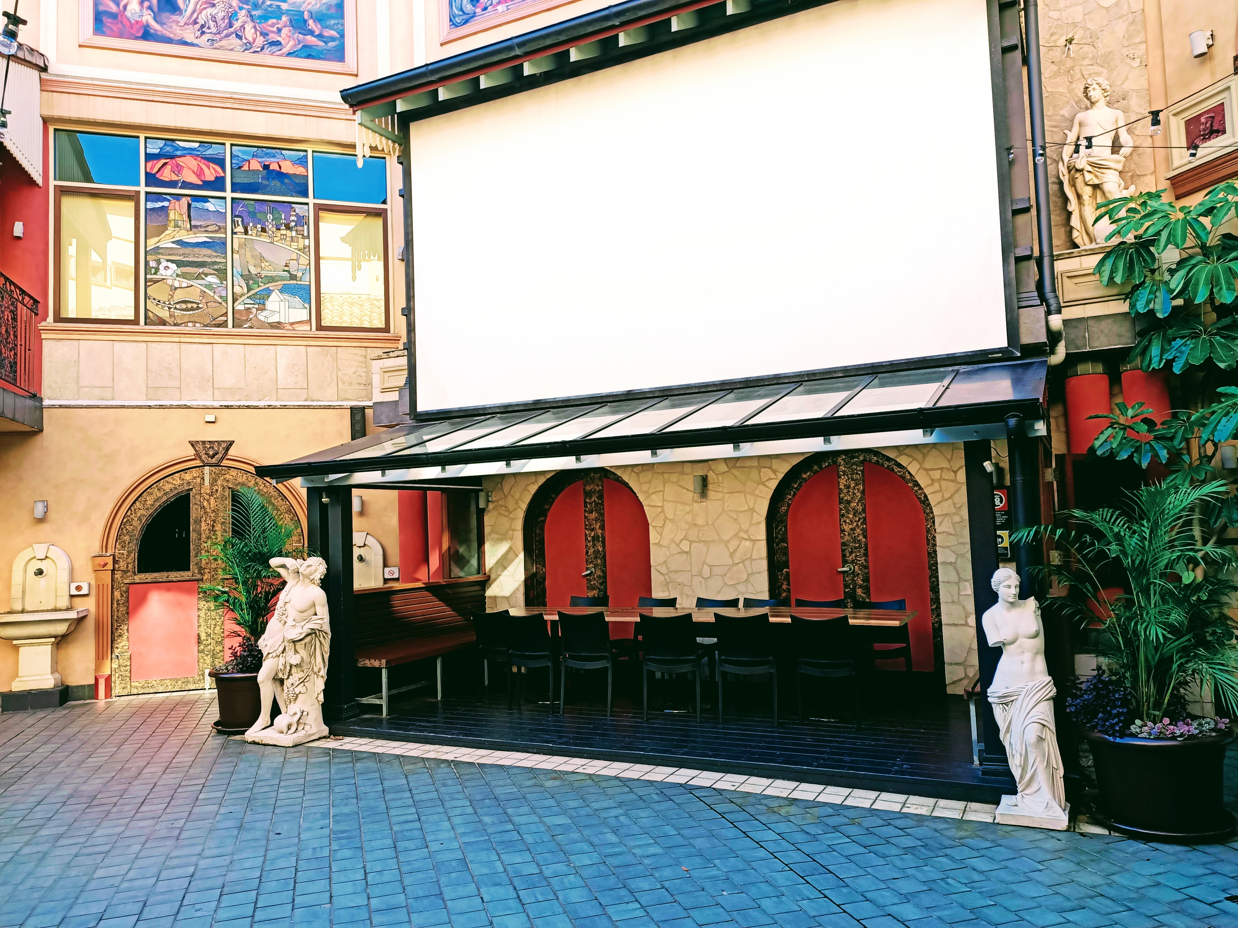 Roman statues and stained glasses at Ettalong Beach Tourist Resort