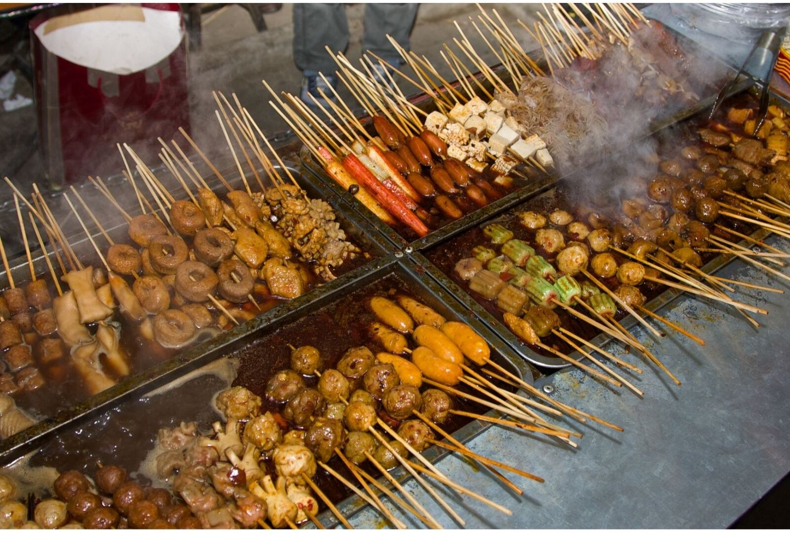 Street food in a Beijing hutong, courtesy of Canva
