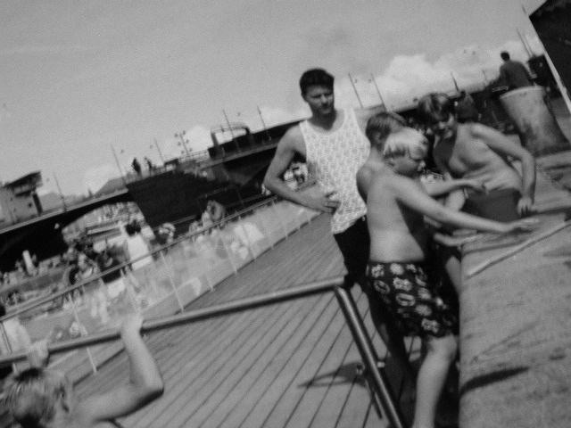 Crossing the Langebro Bridge into Amager one sunny day (August 17 2003), I discovered a swimming pool erected inside the canal. There were many children playing, stunning blonde women in bikinis sunning on the grassy shore, multiracial soccer games and an overabundance of overweight, but nonetheless cheerful Danes.