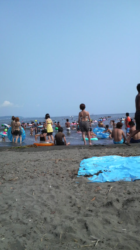 Washing the potatoes at Eastside Beach, Enoshima, near Kamakura south of Tokyo