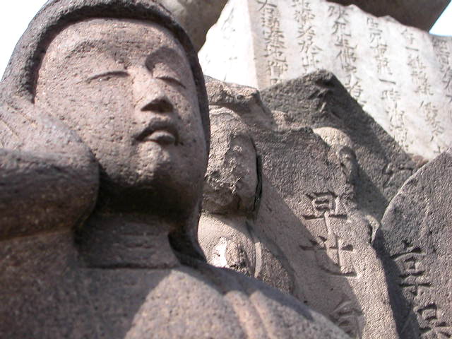 Pantheon of stone Buddhas at a stone cemetery at Nippori Tokyo