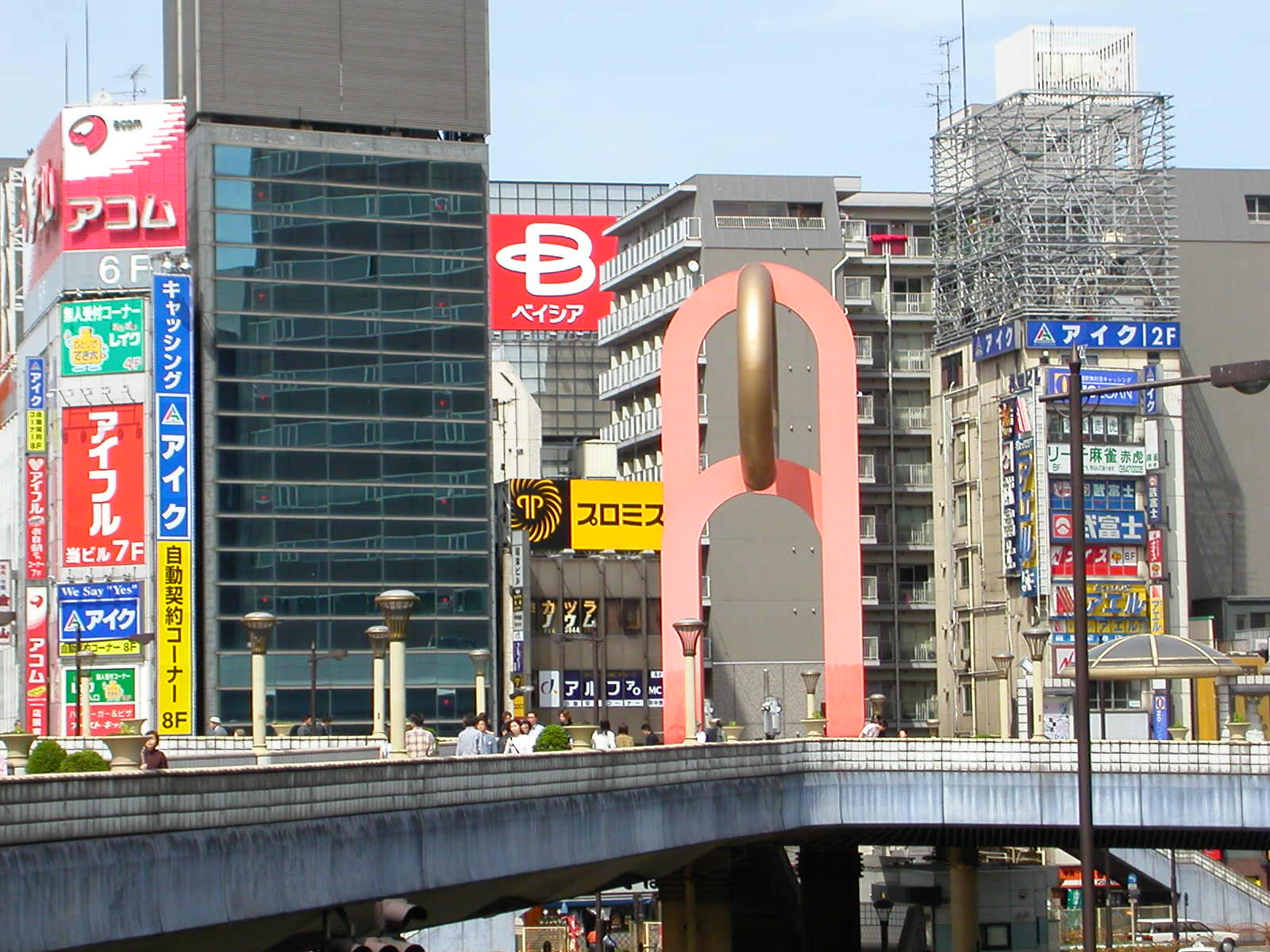In front of Ueno Station is this walkway with civic works and distinctive Tokyo architecture
