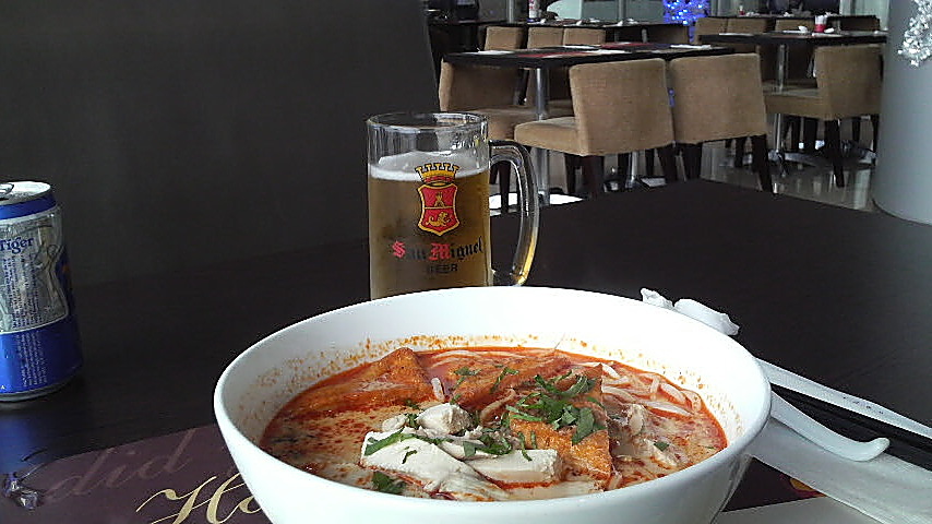 One of my favorite Asian meals, chicken laksa, served with one of my favorite Asian beverages, Tiger Beer, during todays layover in Ho Chi Minh City, Vietnam