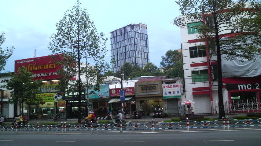 Glass tower seen near the Reunification Palace/Cultural Park green space