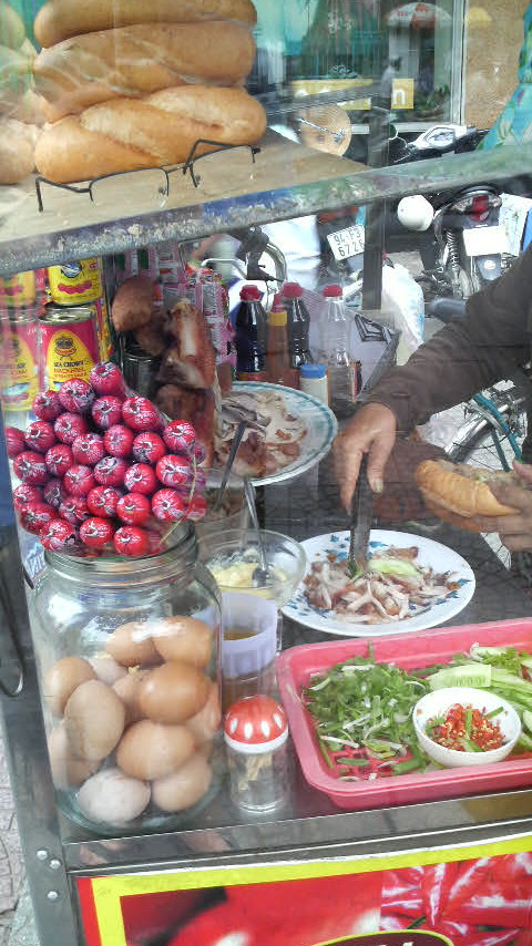 Salty, porky, gristly banh mi at this stand, just across from the Cultural Park in downtown Saigon.