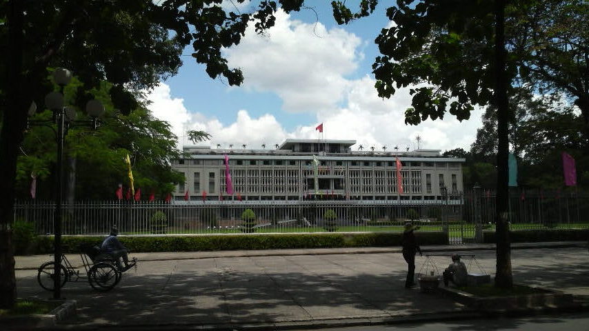 The inevitable touts and cyclo drivers assembled outside the Reunification Hall.